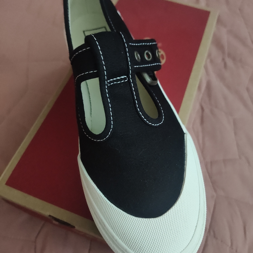 Vans Style 93 Black and White Slip-Ons